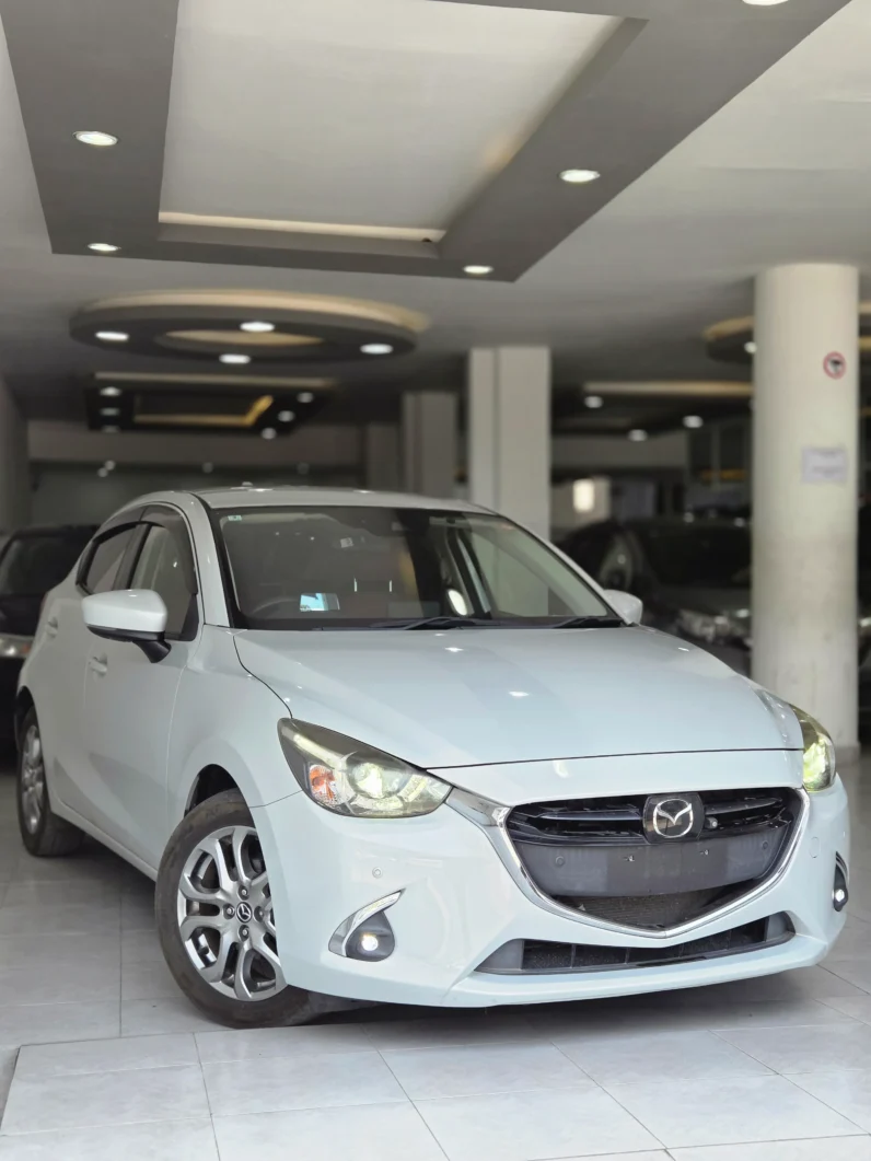 Ash grey Mazda Demio 2018 XD Touring Noble Crimson limited edition with LED headlights and alloy rims at Mundiya International Kenya.