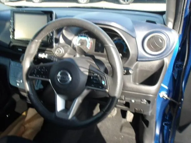 Modern interior of the 2019 Nissan Dayz Highway Star featuring steering controls, push start, and 360-degree camera display for sale in Kenya.