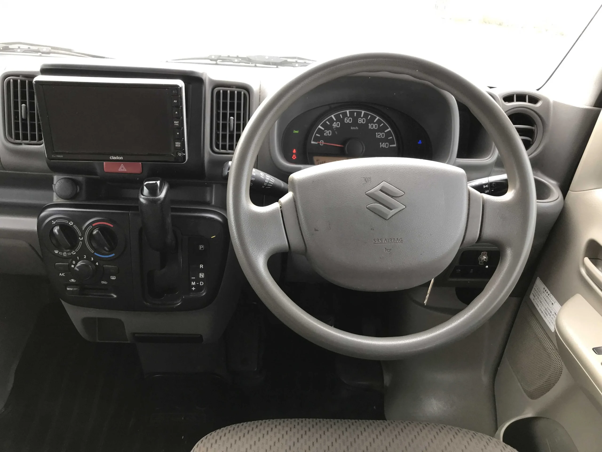 Modern dashboard of the 2019 Suzuki Every featuring a touchscreen infotainment system and automatic gear lever.