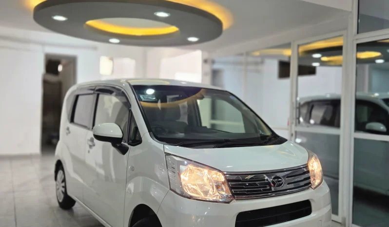 White Daihatsu Move 2020 hatchback featuring a high-roof design and clean modern headlights at Mundiya International Kenya.