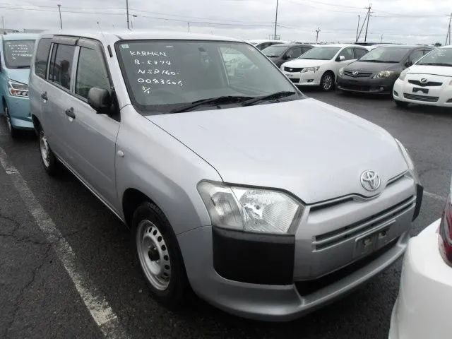 Clean metallic silver Toyota Probox 2019 DX Comfort 2WD station wagon showing its durable black utility front bumper and clear halogen headlights at Mundiya International Kenya.